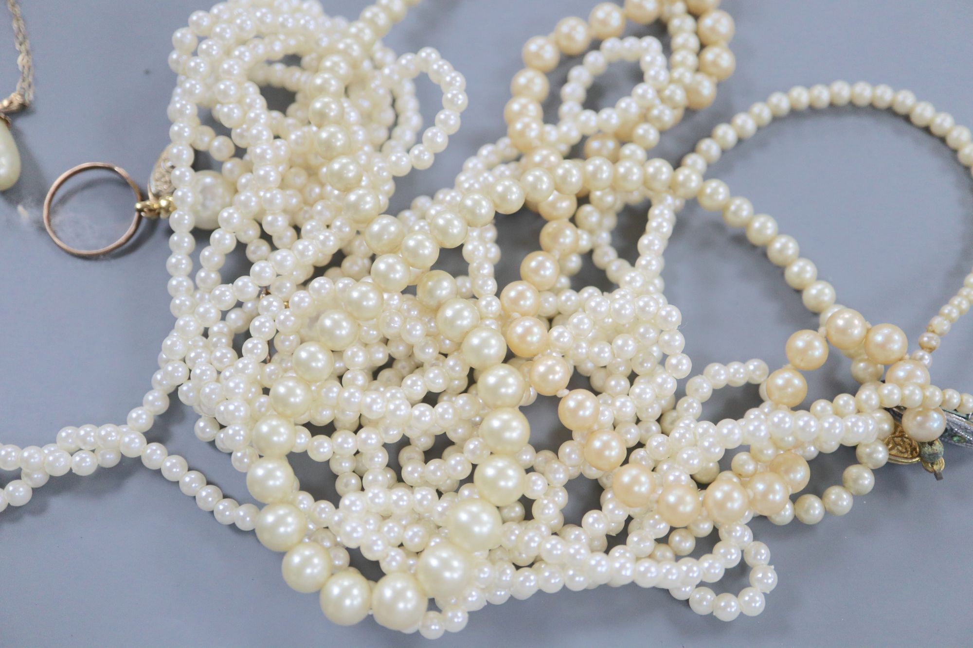 A small collection of jewellery and sundry silver and paste-set jewellery, including two 375 rings and a 9ct chain.
